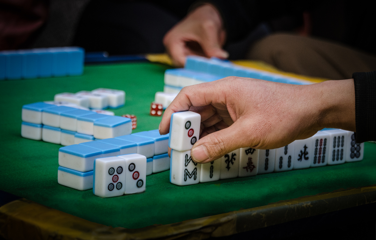 Mahjong: From East to West and Back Again